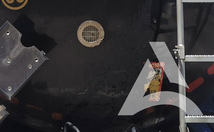 Arrière d'un camion citerne, bitume